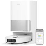 White wall-mounted dust collection unit with a silver base, labeled Auto-Empty Dust Collection, shown next to a smartphone displaying its app interface