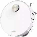 White round robotic vacuum cleaner (Dreame) viewed from above, showing its flat disk shape and side brushes/bumper.