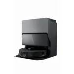 Roborock robotic vacuum seated in a tall black auto-emptying docking station.