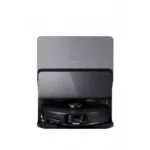 Roborock robotic vacuum resting in a tall gray charging dock.