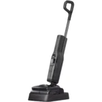 Cordless stick vacuum with a tall handle docked on its charging base.