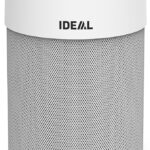 Tall white cylindrical air purifier with a perforated metal base and the IDEAL logo on the upper white housing; green indicator light on top.