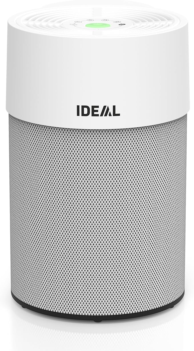 81tbRm2ZQRL_AC_SX679_ 1 - NEVORIXT Tall white cylindrical air purifier with a perforated metal base and the IDEAL logo on the upper white housing; green indicator light on top.