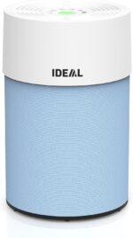 White cylindrical smart speaker with a white top and blue fabric mesh body, IDEAL logo on the side and circular top control buttons.