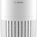White Bosch air purifier, cylindrical tower with vertical slits and circular top vent.