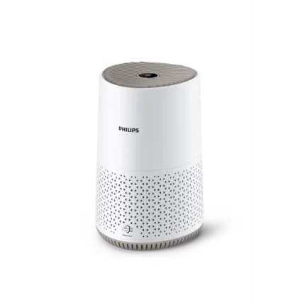 White Philips air purifier, cylindrical design with a perforated base for airflow and a circular top grille.