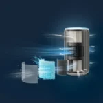 Exploded view of a cylindrical air purifier with internal filter layers and blue airflow lines