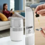 White compact home humidifier on a table; left panel shows living room with a person in background, right panel shows adding essential oil with a dropper to the device.