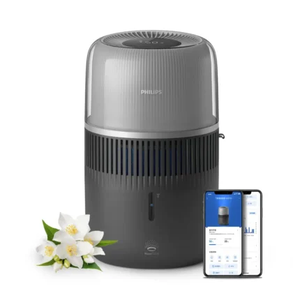 Philips air purifier with a transparent upper chamber and vertical vents, shown with a smartphone app for control.