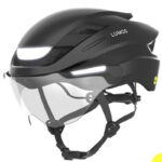 Lumos bike helmet with integrated transparent face shield and LED front light for visibility and protection