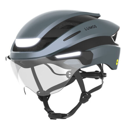 Grey Lumos cycling helmet with integrated front light and clear visor, chin straps attached.
