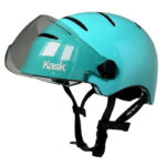 Turquoise Kask cycling helmet with a clear visor and black chin straps.