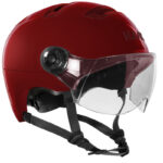 Red protective helmet with clear visor and chin strap shown in side view, safety gear style.