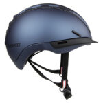 Blue Casco bike helmet with black adjustable chin straps and a quick-release buckle, shown in side view.