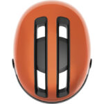 Top-down view of an orange bicycle helmet with black vent slits, highlighting its aerodynamic shape and ventilation.