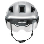 Silver bicycle helmet with integrated clear visor and chin strap, viewed head-on.