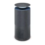 Tall cylindrical air purifier with dark fabric cover and perforated lower section; round top panel with controls.