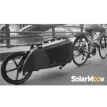 Electric cargo bicycle with a large enclosed pod, rider on a city path; SolarMoov logo bottom-right on the image.