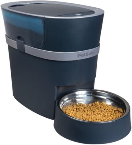 PetSafe automatic pet feeder with a metal bowl of dry kibble in front.
