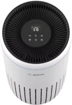 Front view of a Bosch tower fan with a circular black control panel in the center and a vented grille around it