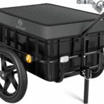 Two-wheeled black utility wagon with a padded lid for carrying cargo, featuring orange reflectors and a tow hitch handle.