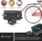 Bicycle cargo trailer with a 70-liter crate and front/side/rear reflectors attached to a red bike from the side.