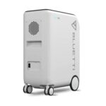 White Bluetti portable power station on wheels, shown from the side with vents and logo visible.