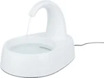 White electric pet water fountain with a curved spout pouring water into a shallow basin.