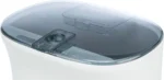 Close-up of a white device with a dark translucent lid and central latch.