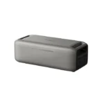 Compact metal power bank with USB ports on the end for charging devices on the go.