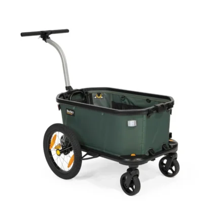 Green Burley cargo trailer with a fabric tub, two large rear wheels, two small front caster wheels, and a curved pull handle for towing.