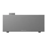 Front view of a gray Anker Solix speaker with small feet, logo centered bottom.