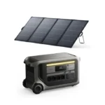 Portable solar panel array folded beside a compact portable power station/generator with outlets and display, for off-grid charging.