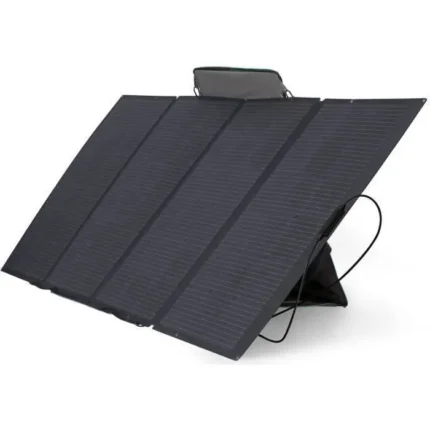 Portable folding solar panel charger with an adjustable kickstand, angled to capture sunlight for charging devices