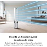 Tall bladeless air purifier in a modern living room projecting blue streams of purified air toward a couple on a bed.