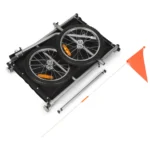Foldable bike trailer with two wheels and orange safety flag, shown collapsed for storage.