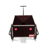 Front view of a black rolling flight case with silver hardware, two red latches, and a vertical pull handle.