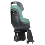 Rear-mounted child bike seat in green and dark gray with footrests and harness for attaching a child on a bicycle