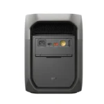 Back panel of a desktop UPS unit showing an outlet, control buttons, and a round circular connector.