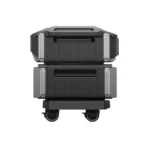 Stack of rugged, black equipment cases on a wheeled rolling cart with silver corner protectors