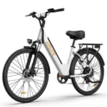 White URBEE electric city bike with step-through frame, front suspension, disc brakes, and a rear cargo rack.
