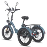 Blue three‑wheel cargo e-trike with a rear rack and two back wheels behind the seat, front wheel with handlebars and mirrors.