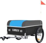 Two-wheeled cargo trailer with a blue cover and black body labeled 'CARGO II', hitched to a tow bar with a red flag at the rear.