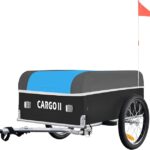Two-wheeled cargo trailer with a blue cover and black body labeled 'CARGO II', hitched to a tow bar with a red flag at the rear.