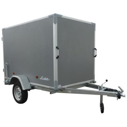 Gray enclosed cargo trailer on a single-axle chassis with a tow hitch and jockey wheel, ready to tow.